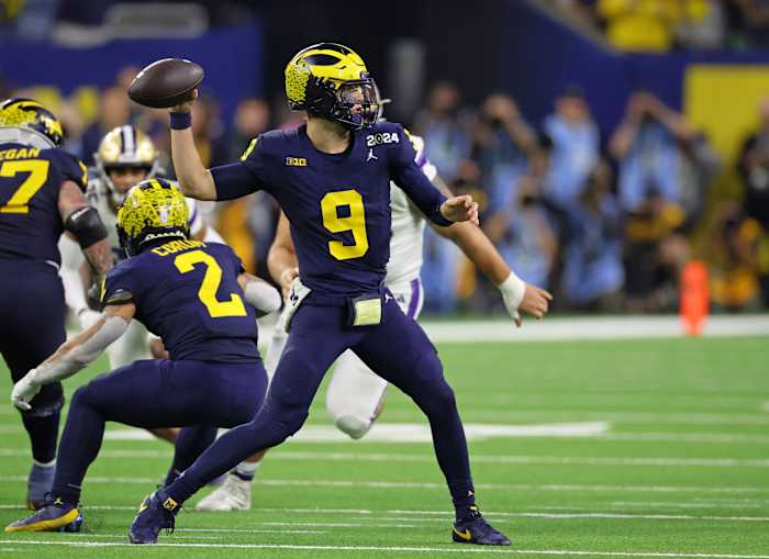 Jan 8, 2024; Houston, TX, USA; Michigan Wolverines quarterback J.J. McCarthy (9) passes the ball against the Washington Huskies during the third quarter in the 2024 College Football Playoff national championship game at NRG Stadium. 